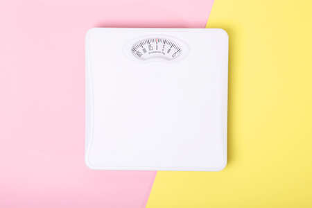 floor scales on a colored background top view.の写真素材