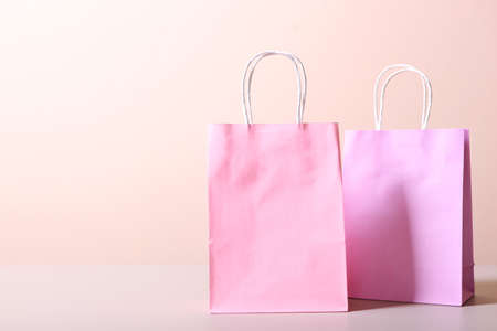 bags for shopping on a colored background. Paper bags for shopping.