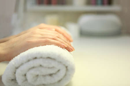 Closeup shot of a woman in a nail salon getting a manicureの写真素材