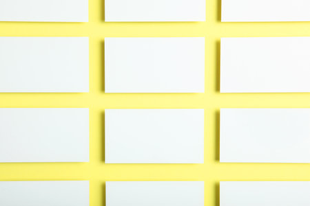 business cards on a colored background top view. Place to insert textの写真素材