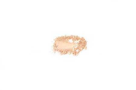 Smears of different decorative cosmetics on a white background isolated