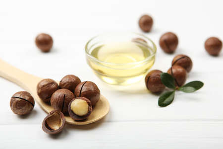 macadamia oil on the table. Minimalism, place for textの写真素材