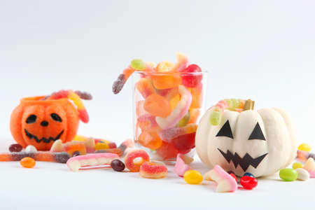 Halloween background with gingerbread and other sweets with place for textの写真素材