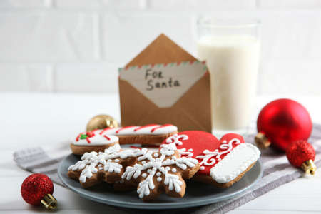 milk and Christmas cookies for Santa on the table. Christmas backgroundの写真素材