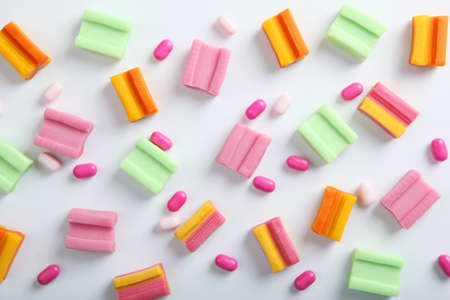 Many different chewing gums on the tableの写真素材