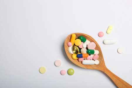 pills on a light background top view. Medicine, treatment, illness. Medication in tablets. High quality photoの写真素材