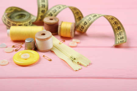 different sewing accessories on the table.の写真素材