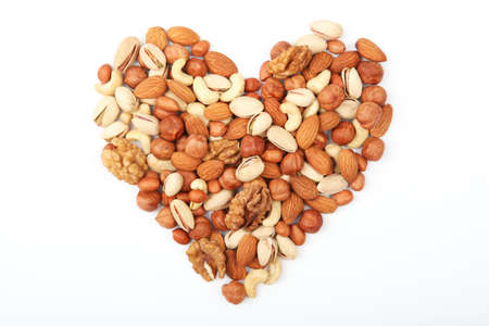 Set of different nuts on a light background.
