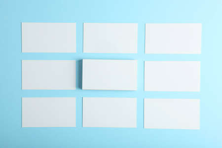 business cards on a colored background top view. Place to insert textの写真素材