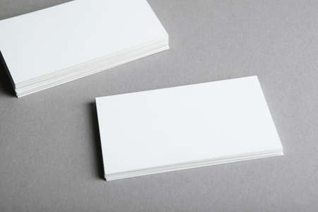 business cards on a colored background top view. Place to insert textの写真素材