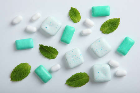 mint chewing gum and mint on the table. Fresh breath, oral careの写真素材