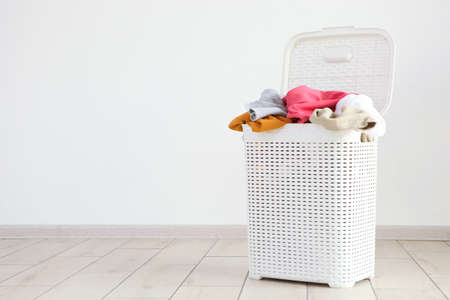 Linen in a basket in the interior of the roomの写真素材