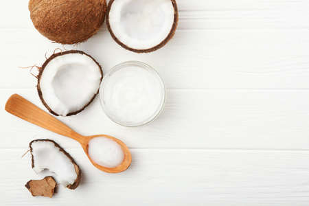 coconut oil and coconuts on the table