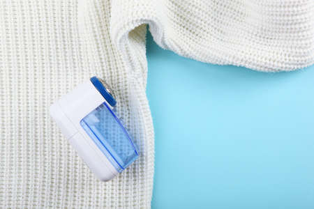 Modern Electric Fabric Shaver and Wool Sweater