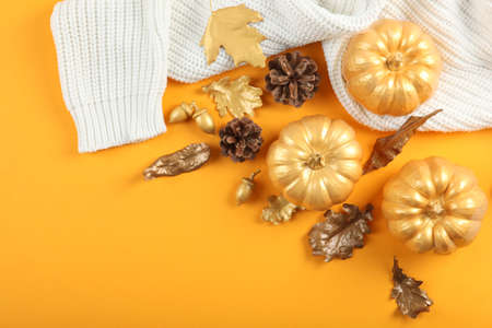 Beautiful stylish autumn background with golden leaves top viewの写真素材