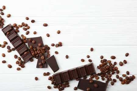 coffee beans and chocolate on the tableの写真素材