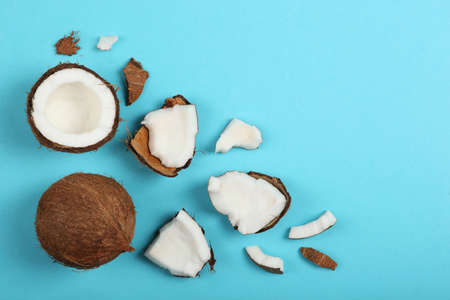 broken coconut on a colored background.