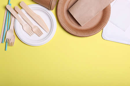 eco friendly dishes on a colored background top view. Eco-friendlyの写真素材