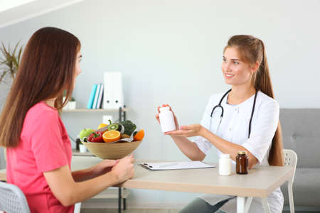 doctor nutritionist takes a patient in the office. proper nutritionの写真素材