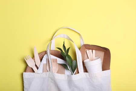 eco friendly dishes on a colored background top view. Eco-friendly