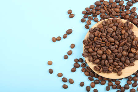 coffee beans on a colored background. Place to insert text, minimalism