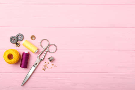 different sewing accessories on the table.