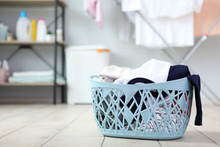 Linen in a basket in the interior of the roomの写真素材