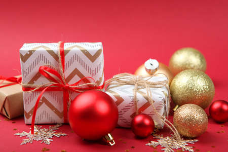 Set of beautifully wrapped gift boxes and Christmas decor .