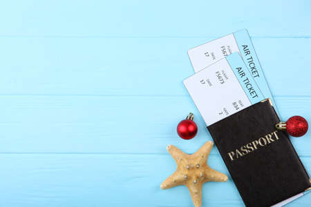 plane tickets and Christmas accessories. Christmas holidays, vacation