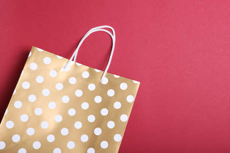 packages for shopping on a colored background top view.