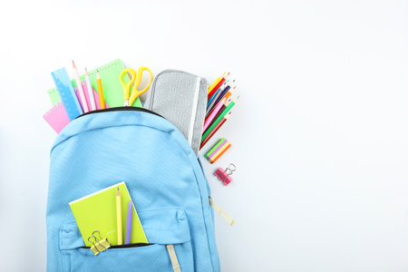 School office on a colored background top view. . High quality photo