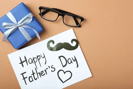 Background to the day of the father on a colored background top view.