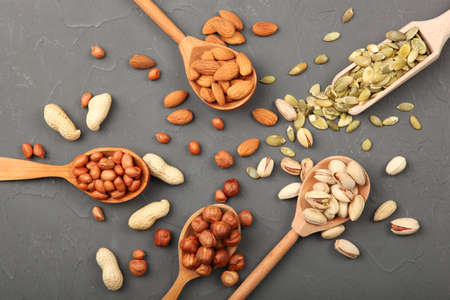 A set of different nuts on the table.の写真素材