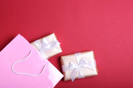 packages for shopping on a colored background top view.