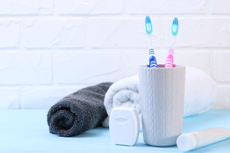 Toothbrushes and oral cleaners on the table.の写真素材