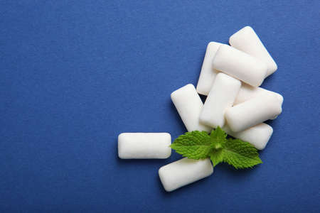 mint chewing gum and mint on the table. Fresh breath, oral careの写真素材
