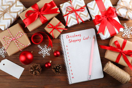 Christmas shopping list. Composition on the theme of christmas shopping top viewの写真素材