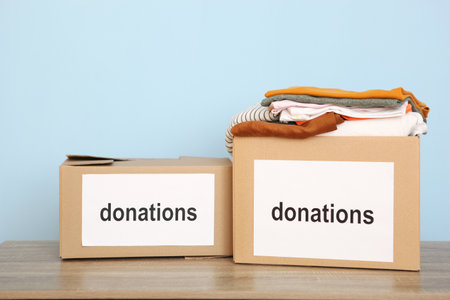 boxes with donations with the necessary things on the table