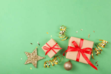 Set of beautifully wrapped gift boxes and Christmas decor .