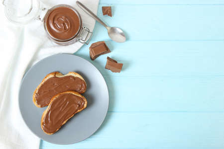 Toast with chocolate paste on the table.の写真素材