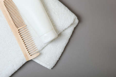 hair care products and comb on the table top view.の写真素材