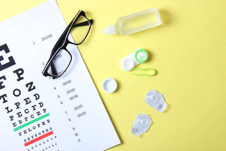 table for checking vision, glasses and lenses for correcting vision