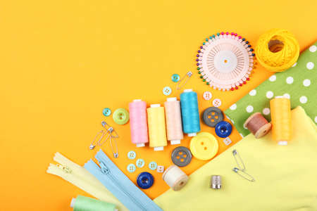 different sewing accessories on the table.の写真素材