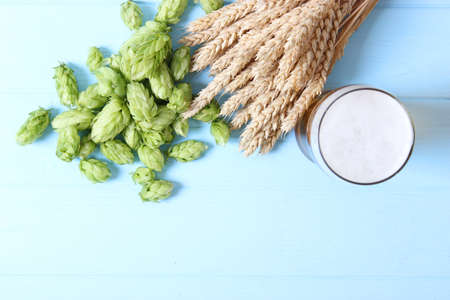 Beer, wheat and hops on the table.の写真素材