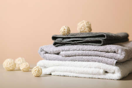 a stack of fresh towels on the table.の写真素材