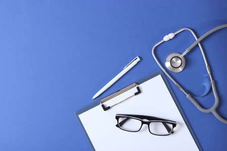 Doctors desk top view. Set of different doctor accessories.の写真素材