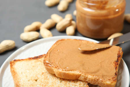 toast with peanut butter on the table.