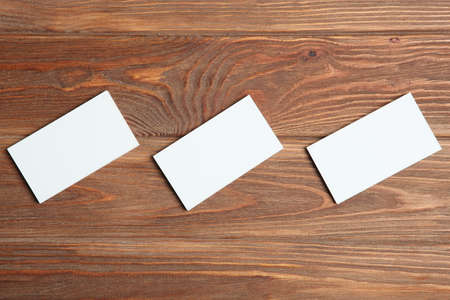 business cards on a colored background top view. Place to insert textの写真素材