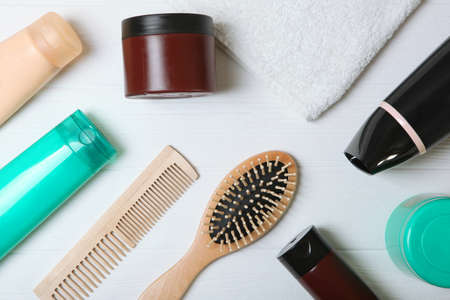 hair care products and comb on the table top view.の写真素材