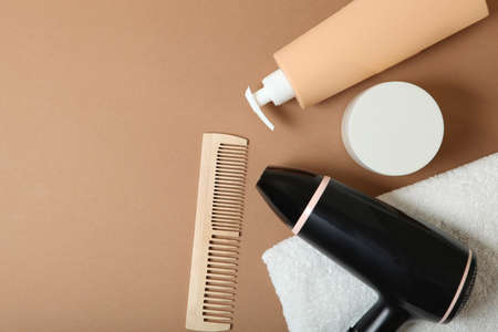 hair care products and comb on the table top view.の写真素材